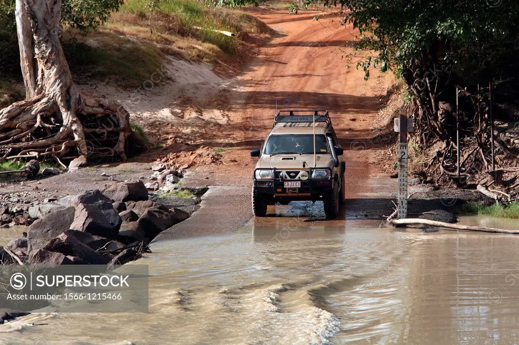 4WD vehicle crossing the East Alligator river at Cahill´s crossing  Kakadu National Park, Northern Territory, Australia