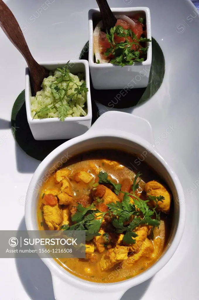 Mauritius, Belle Mare, Mauritian dish chicken with Indian spices and coriander at The Residence Resort