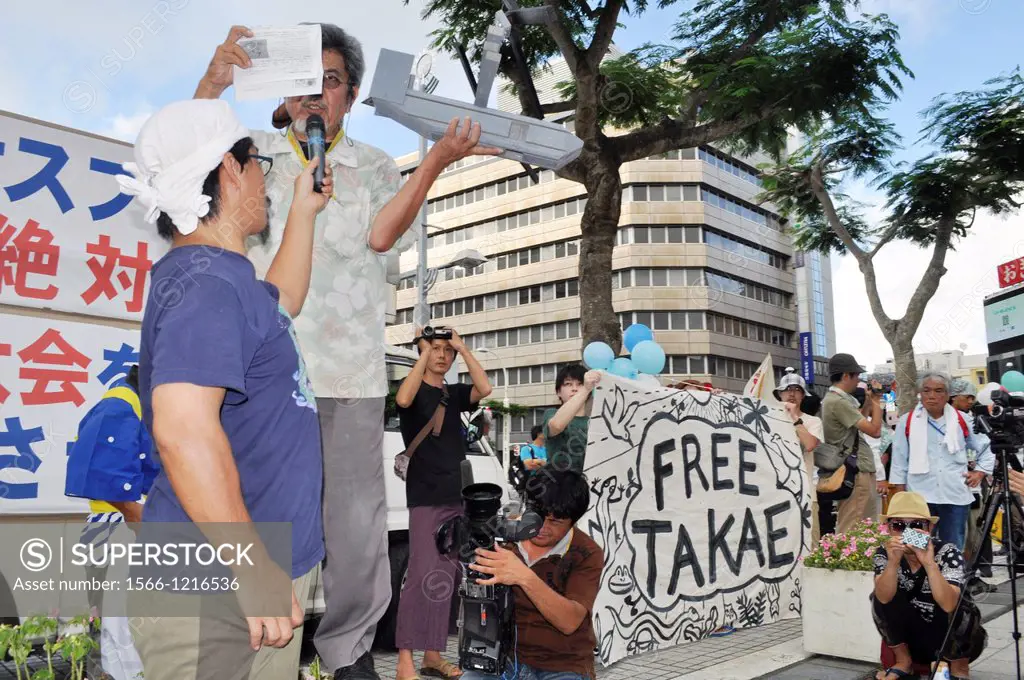 Naha, Okinawa, Japan, people gathering in front of Okinawas Prefecture to protest against the American military occupation of Okinawa, the use of V-2...
