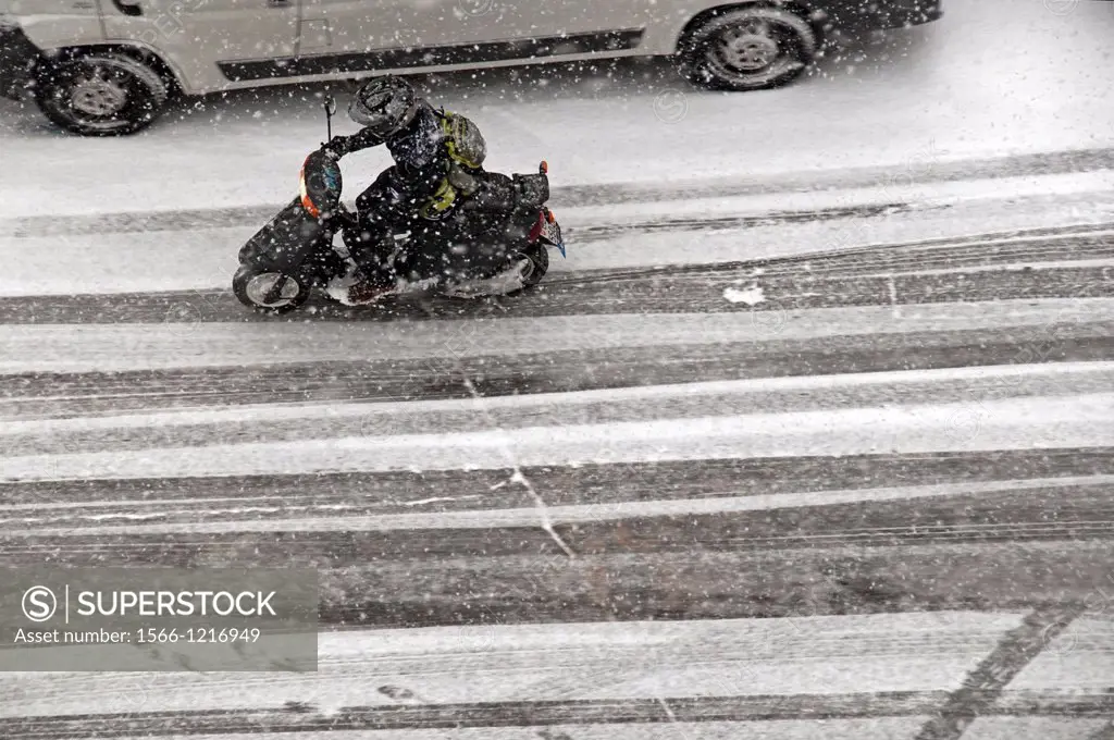 winter motorcycling problems in heavy snowfall, Geneva, Switzerland