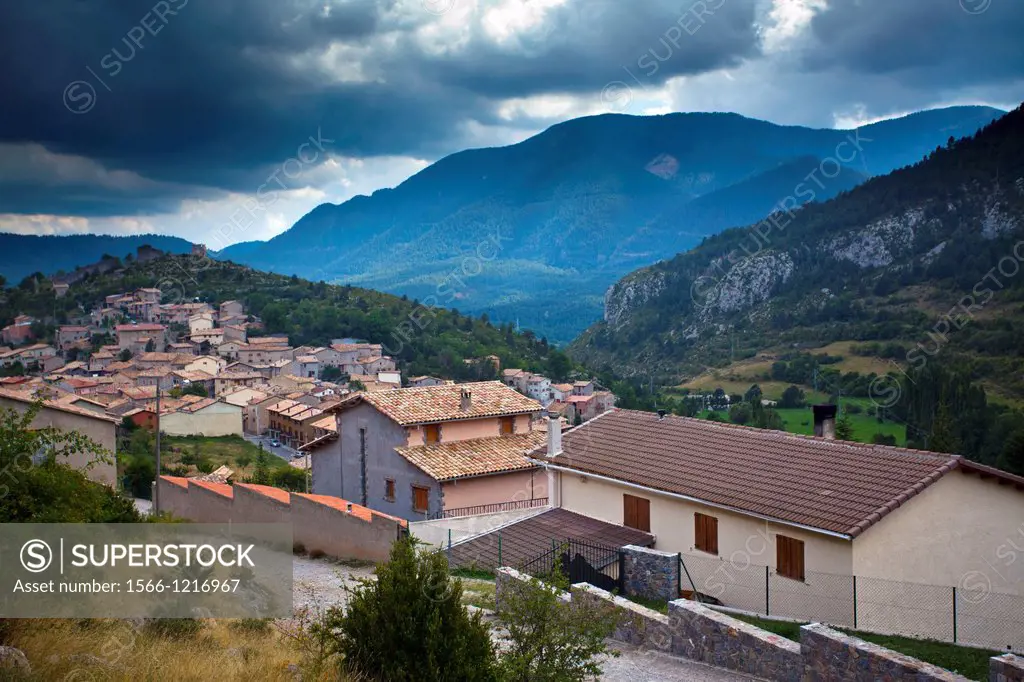 Spain, Catalonia, Pyrenees, Gósol  A storm brews above the village of Gosol in the Catalonian Pyrenees mountains