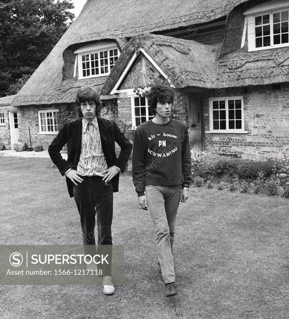 Keith Richards and Mick Jagger exclusive image from 1967 by David Cole in the gardens at Redlands at the time of the police drugs raid