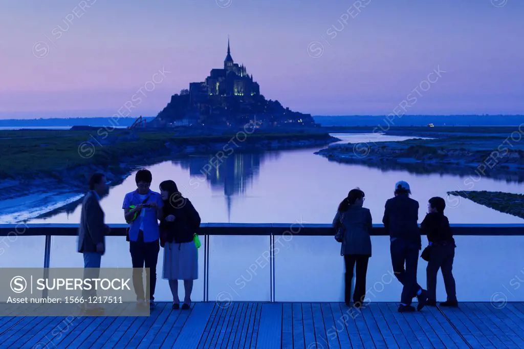 France, Normandy Region, Manche Department, Mont St-Michel, Le Barrage du Mont Saint Michel dam, dusk, silhouettes of people, NR