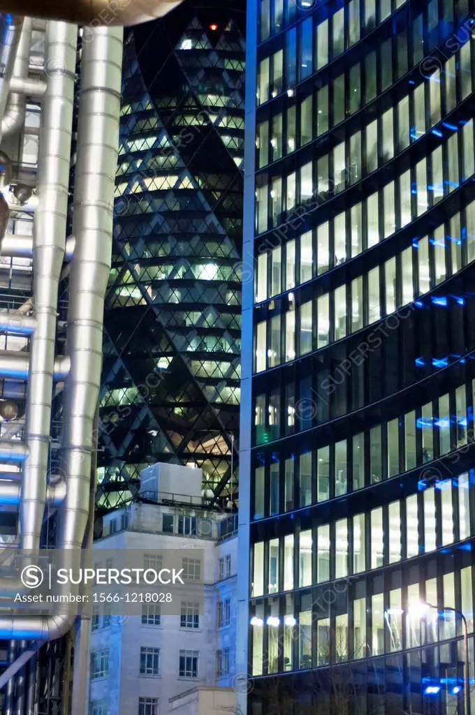 The Willis Building and Swiss Re Tower at night, City of London, UK