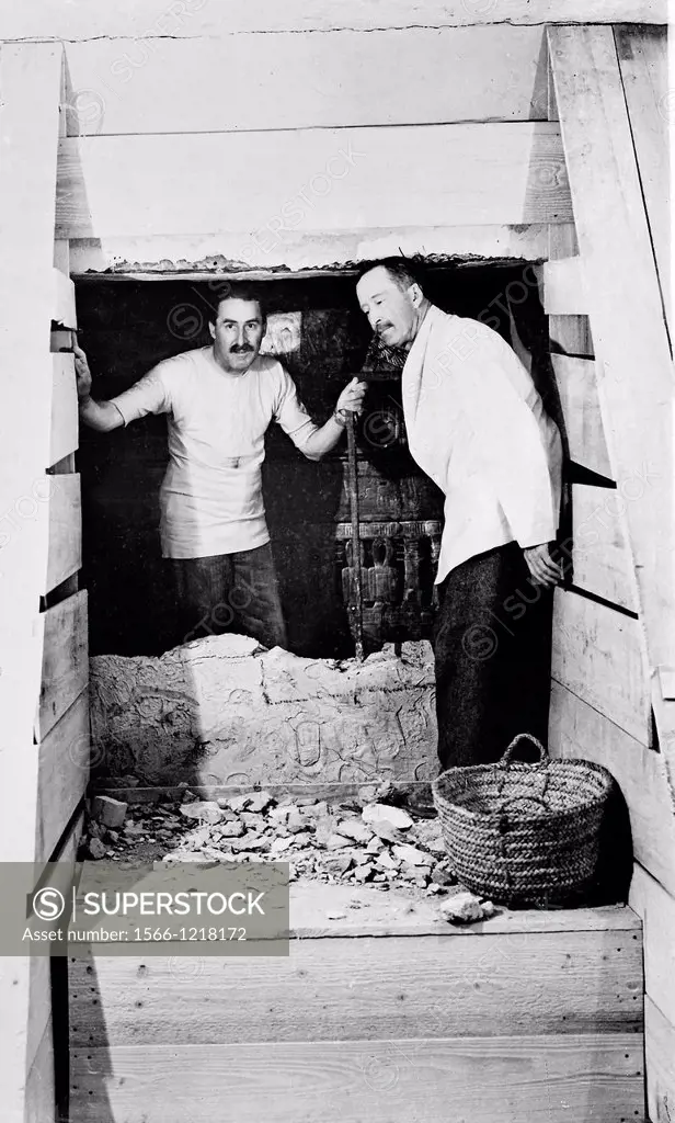 Howard Carter who discovered Tutankhamun´s Tomb in the Valley of the Kings, Luxor, Egypt  November 1922 on the left inside the tomb   From the archive...