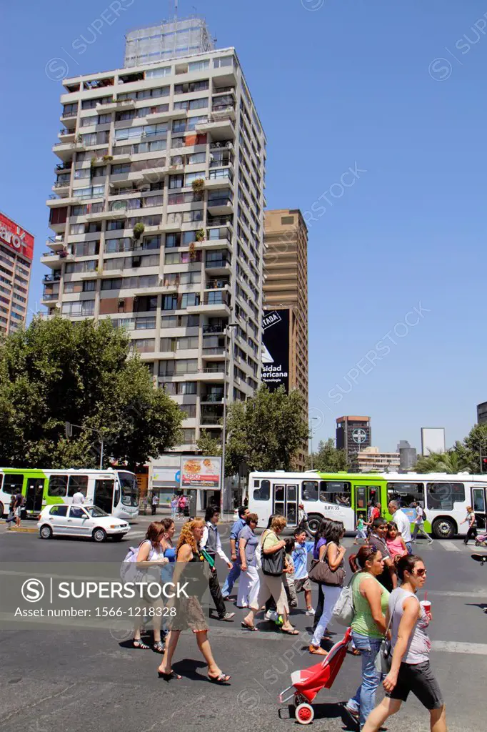 Chile, Santiago, Providencia, Avenida Vicuna Mackenna, Plaza Italia, street scene, urban neighborhood, crossing, traffic, bus, car, high rise, buildin...