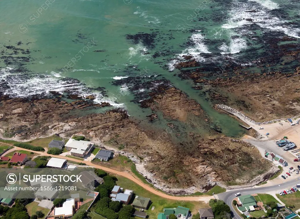 Aerial photography of White shark diving/ and whale watching tourism boats at Kleinbaai harbour in the Western Cape, South Africa