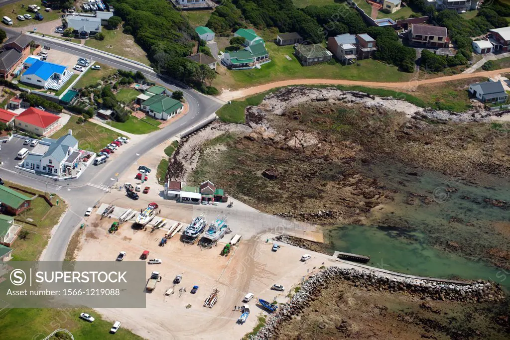 Aerial photography of White shark diving/ and whale watching tourism boats at Kleinbaai harbour in the Western Cape, South Africa