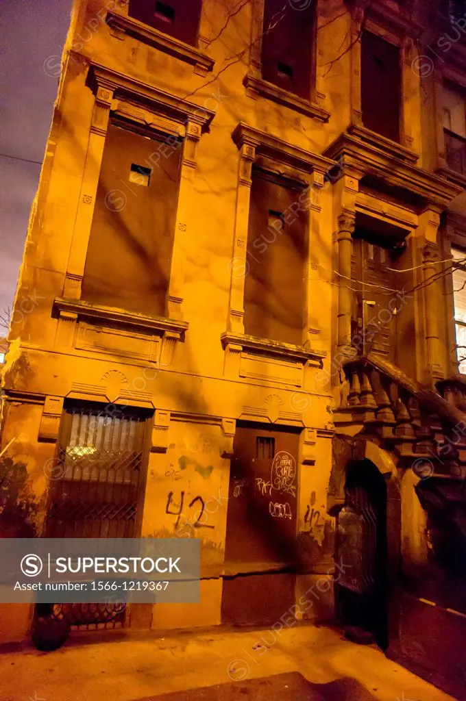Dilapidated brownstone waiting for restoration in Harlem in New York