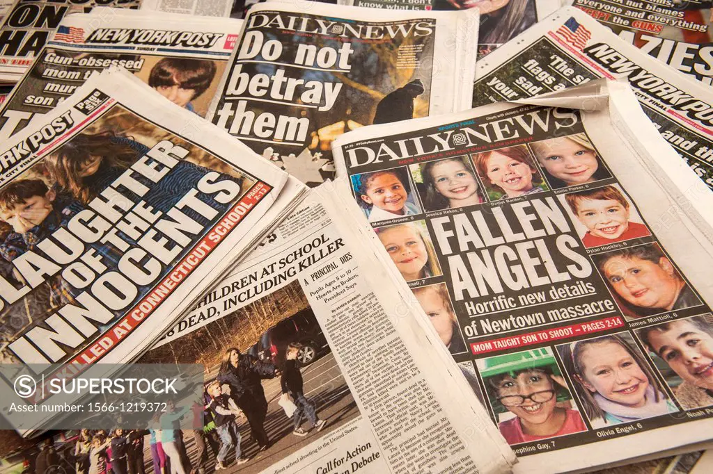 Front pages of over a weeks worth of New York newspapers report on the December 14, 2012 shooting by Adam Lanza of 26 people in the Sandy Hook Element...