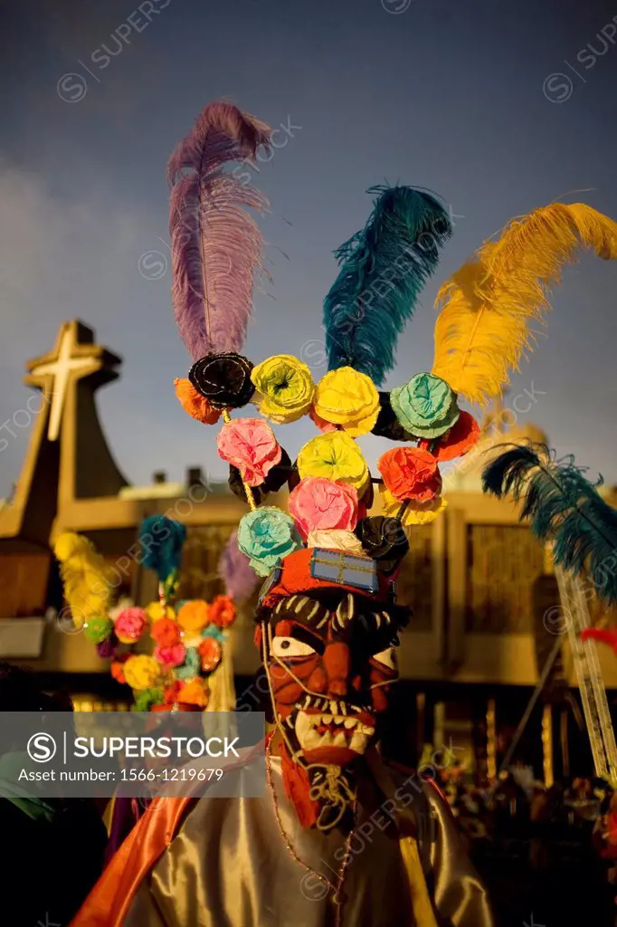 A pilgrim from Tomatlan, Veracruz state, dressed as a red devil performs the Baile de los Santiagos or Saint James´s Dance outside of the Our Lady of ...