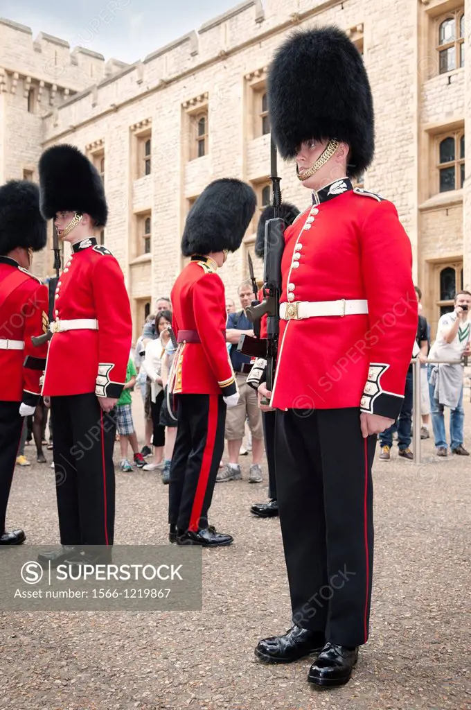 Royal Scots guards being inspected by their superior officers at the changing of the guard  Tower of London UK