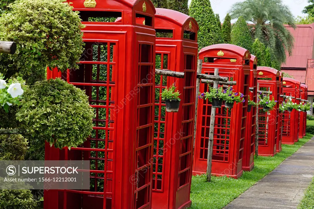 Red telephone booths at Nong Nooch Village Garden, Thailand
