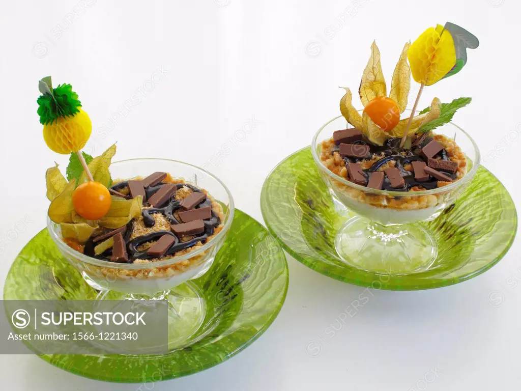 Natural yoghurt Cup with Biscuit and chopped almonds and two chocolates