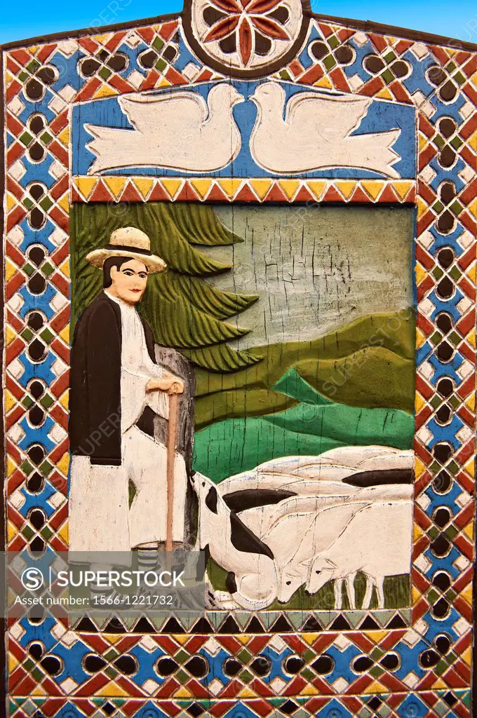 Tombstone of a shepherd in the fields, The Merry Cemetery Cimitirul Vesel, Maramares, Northern Transylvania, Romania The naive folk art style of the t...