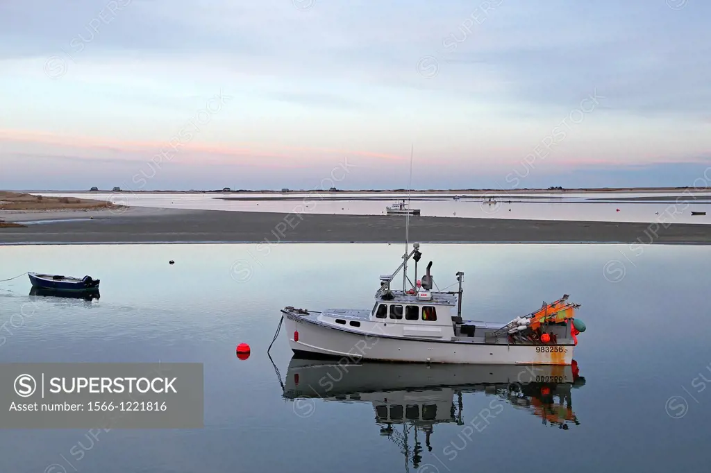 A boat at sunset near Chatham Fish Pier  Chatham, Cape Cod, Massachsuetts