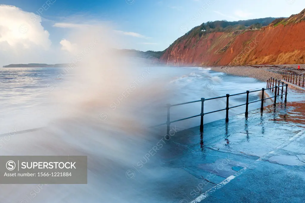 Waves crashing against walkway in Sidmouth, Devon, England, United Kingdom, Europe