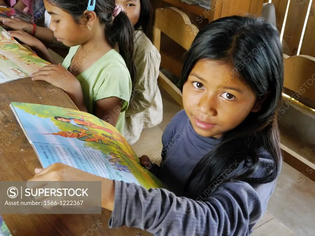 CAMBODIA. Projects of DPA in Stung Treng, supported by SCIAF. Katot village  Girls at the village literacy centre