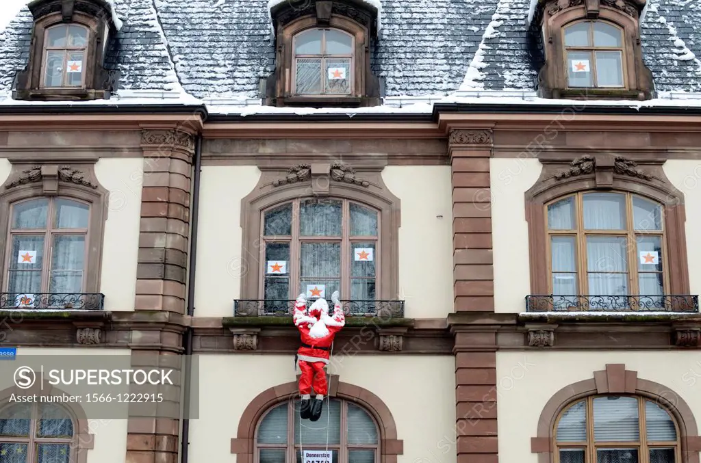 ´Father Christmas´ dummy on building exterior, Basel, Switzerland