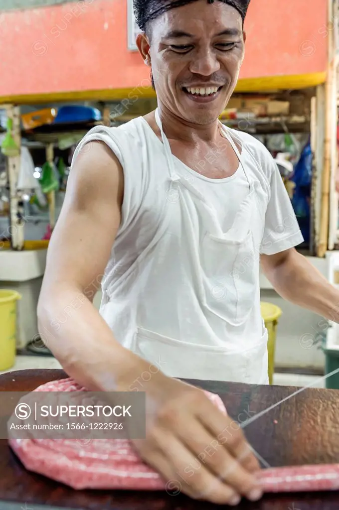 Man hand-making sausages Carbon market, Cebu, Visayas, Philippines, South East Asia