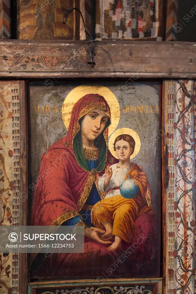 Romania, Bucharest, Museum of the Romanian Peasant, Romanian Orthodox church altar, religious painting of Virgin Mary.