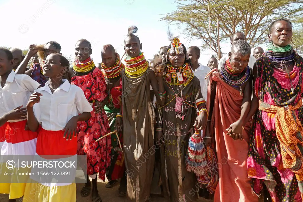 Kenya. Turkana tribespeople dancing at the event of a confirmation ceremony in Lorugumu, Turkana.