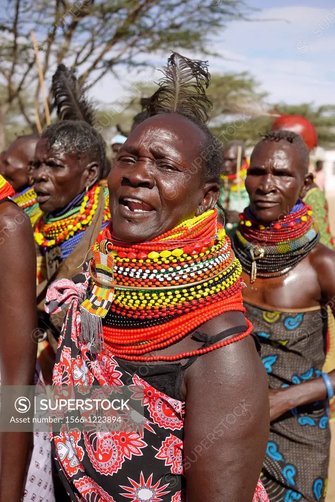 Kenya. Turkana tribespeople dancing at the event of a confirmation ceremony in Lorugumu, Turkana