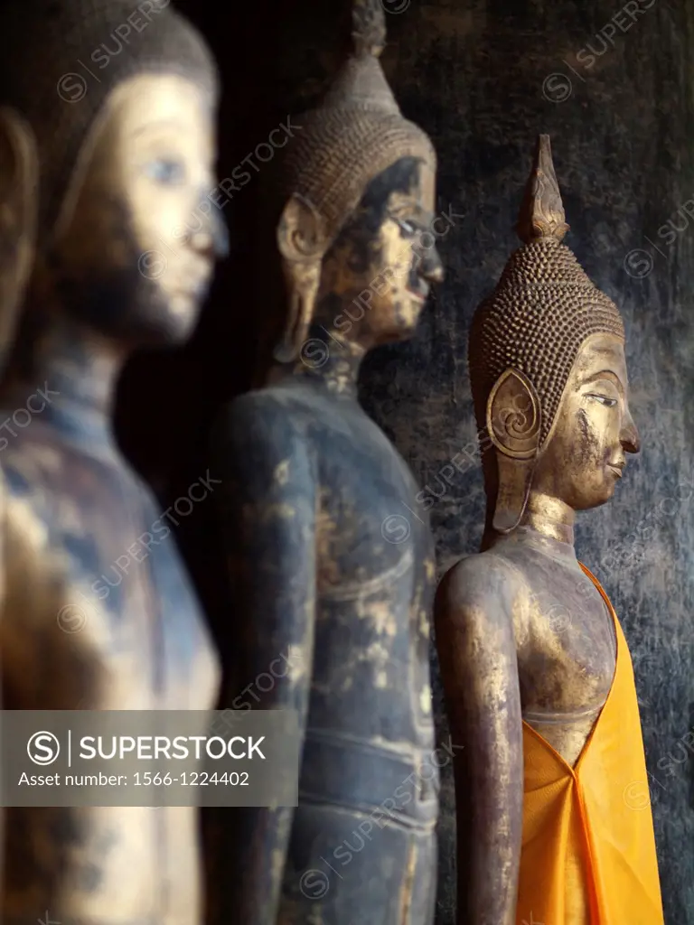 Buddha statues inside Vat Visounnarath in Luang Prabang Laos