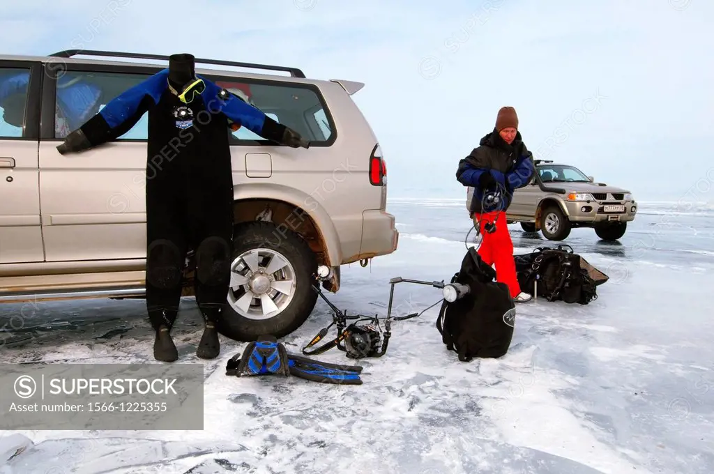 Preparations for ice-diving, in Lake Baikal, Olkhon island, Siberia, Russia, Eurasia