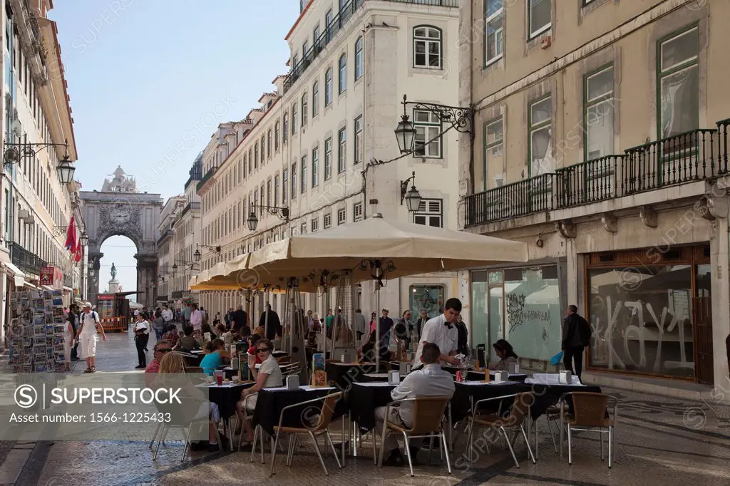 Portugal Lisbon. Rua Augusta. People in outdoor restaurant.