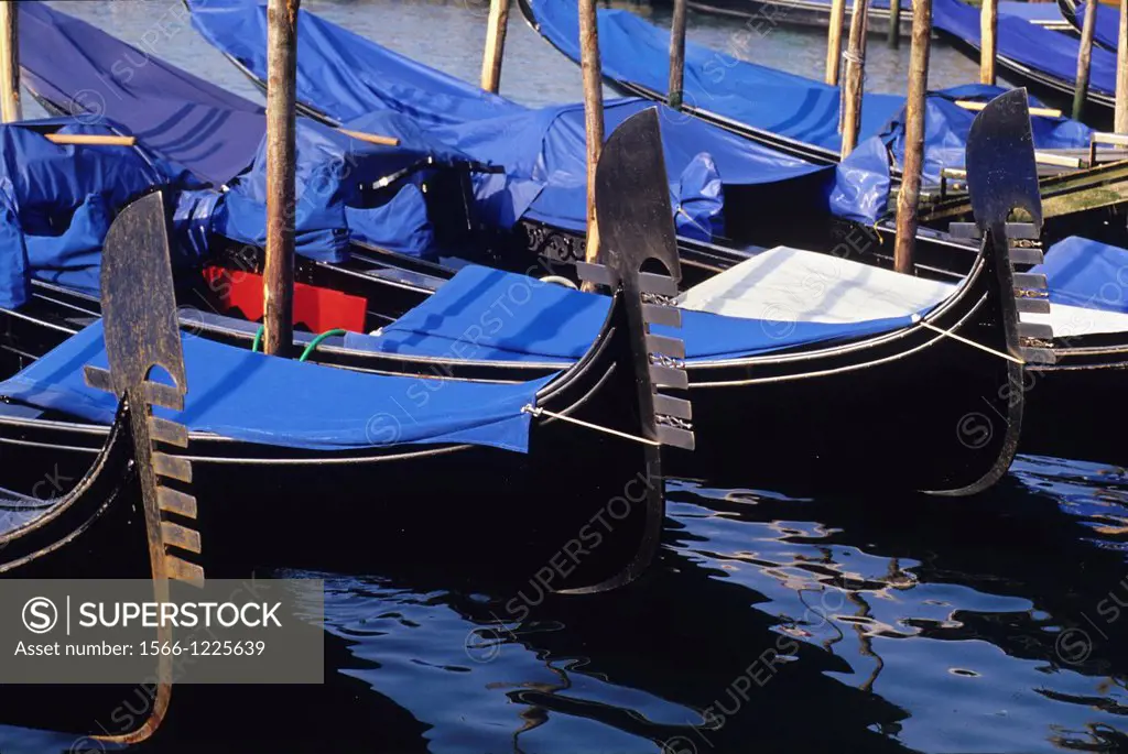 gondolas moored at Riva degli Schiavoni, Venice, Veneto region, Italy, Europe
