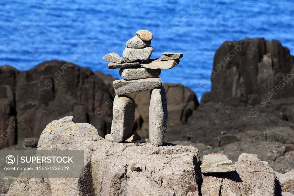 An inuksuk plural inuksuit from the Inuktitut: , plural , alternatively inukshuk in English or inukhuk in Inuinnaqtun is a stone landmark or cairn bui...