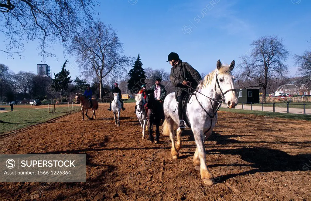 UNITED KINGDOM LONDON HYDE PARK AT SPRING RIDERS AND HORSES ON A BRIDLE PATH