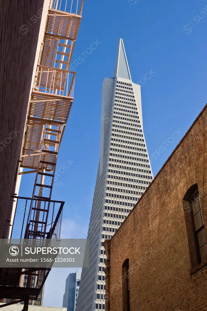 Trans-America pyramid architect: William Pereira and old brick buildings with fire escape, San Francisco, California, USA