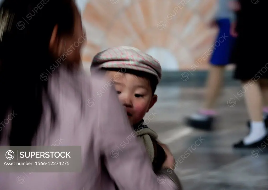 Mother Holding Her Child In Her Arms, North Korea