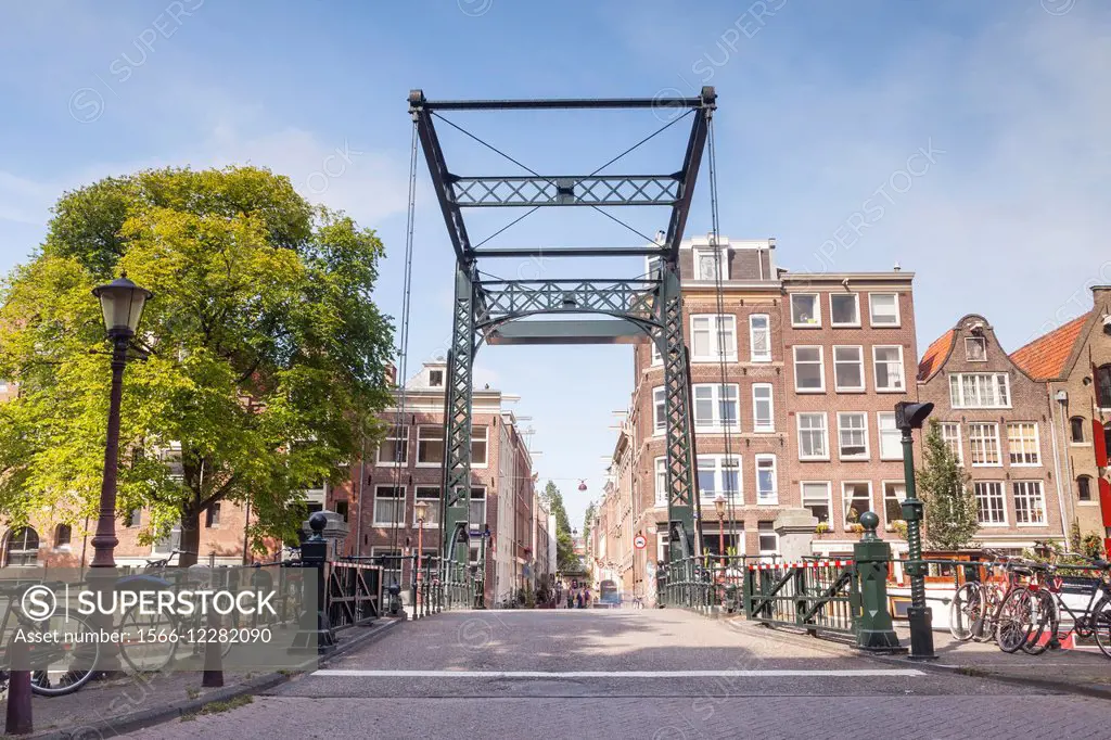 A canal bridge in Amsterdam. The canals of the historic centre of the city have been designated a World Heritage Site by UNESCO.