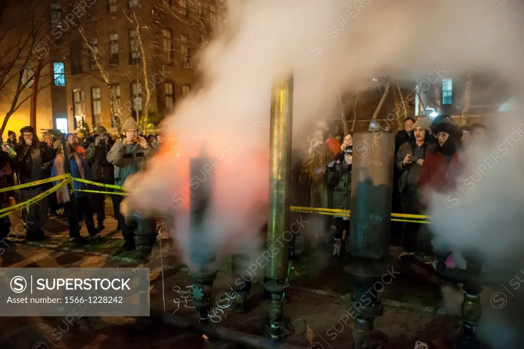 Crowds of visitors and Pratt Institute students and faculty welcome in the New Year, Tuesday, January 1, 2013 at the school´s steam generating plant i...