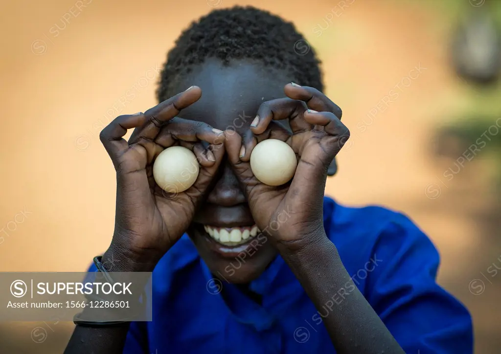 Anuak Tribe By Playing With Eggs, Gambela, Ethiopia.