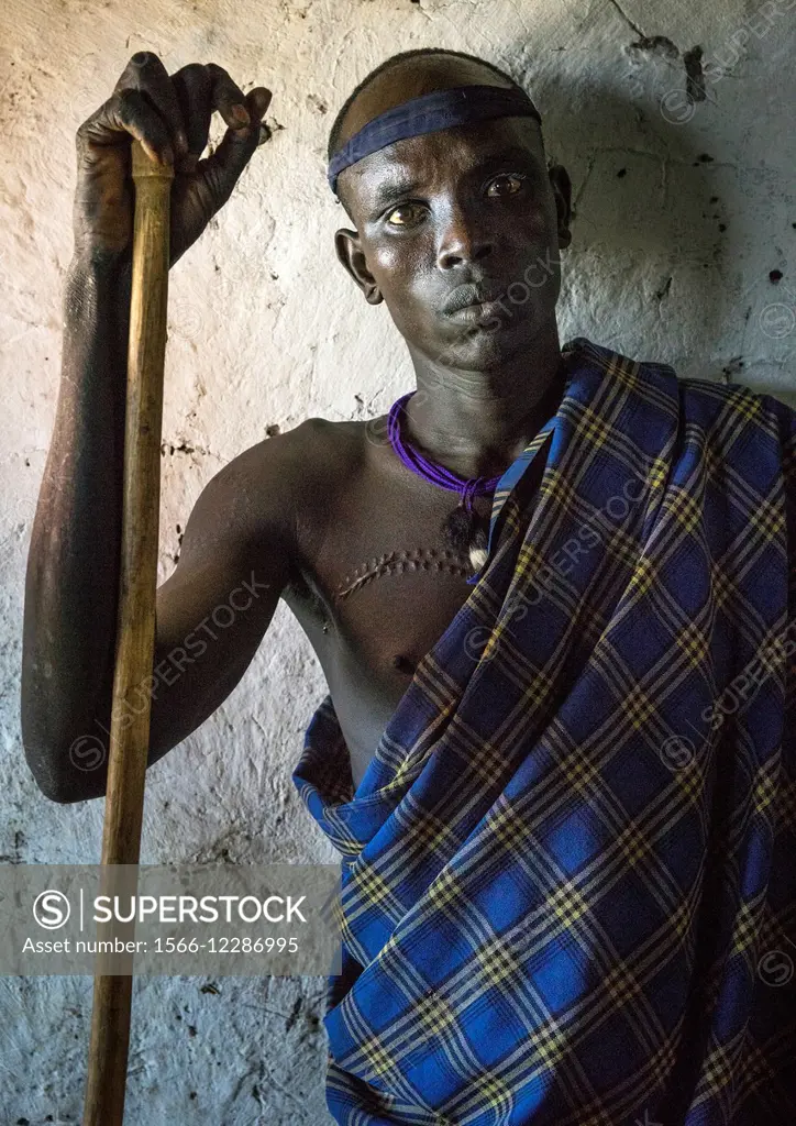 Mursi Tribe Warrior, Hail Wuha Village, Ethiopia.