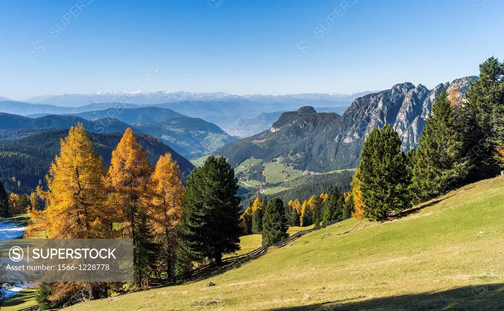 View of the city of Bozen or Bolzano during fall, the capital of the province South Tyrol or Alto Adige seen from the Dolomites  The snow covered peak...