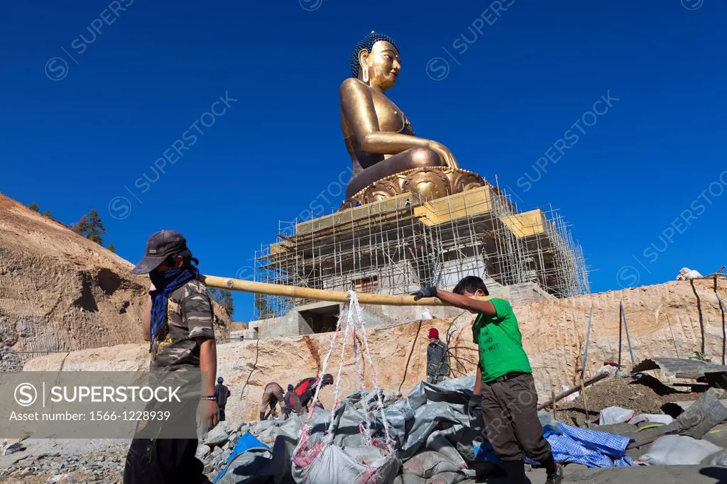 Workers in the cosnstruction of the Giant Buddha Dordenma Statue in Kuensel Phodrang, Thimphu, Bhutan, Asia.