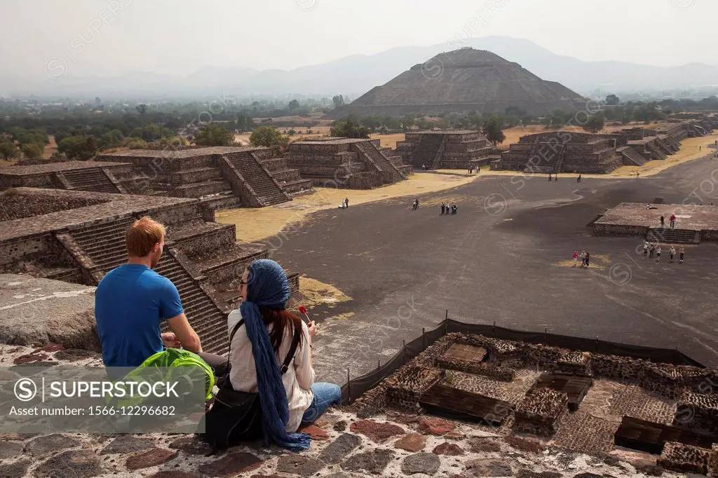 People at the top of the Temple of the Moon with the Temple of the Sun at the background in Teotihuacan Ruins, Teotihuacan Archaeological Site, Mexico...