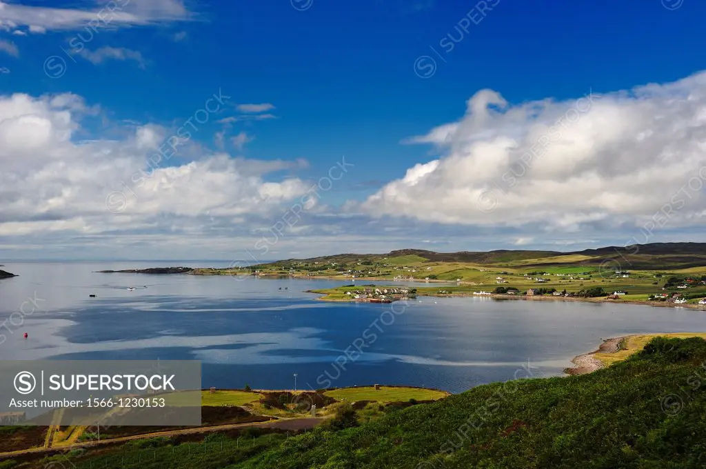 Loch Ewe and the village of Aultbea, Wester Ross, Scotland, UK with MOD naval refuelling depot in the foreground