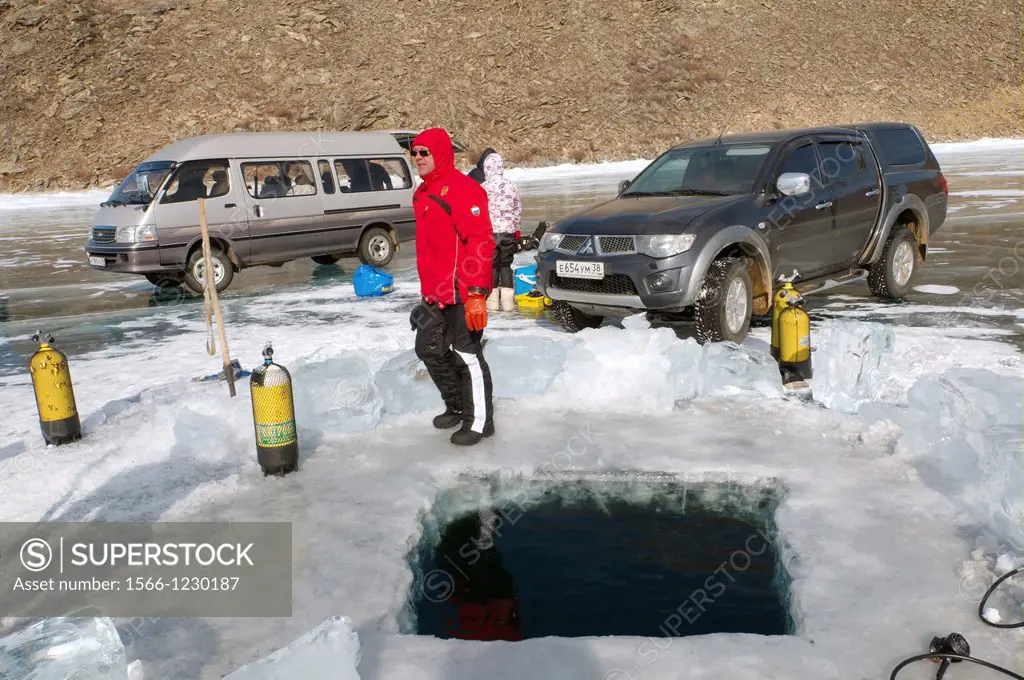 Preparations for ice-diving, in Lake Baikal, Olkhon island, Siberia, Russia, Eurasia