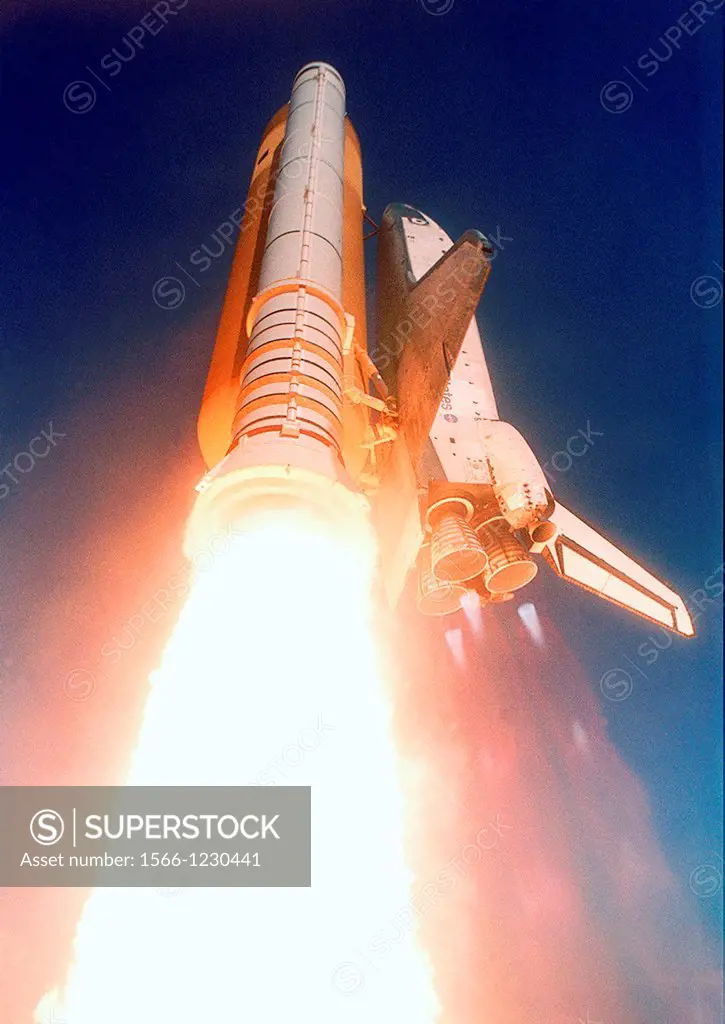 STS110-S-046 8 April 2002 --- A low-angle still photo captures the Space Shuttle Atlantis lifting off from KSC´s Launch Complex 39 at 4:44:19 p m  EDT...