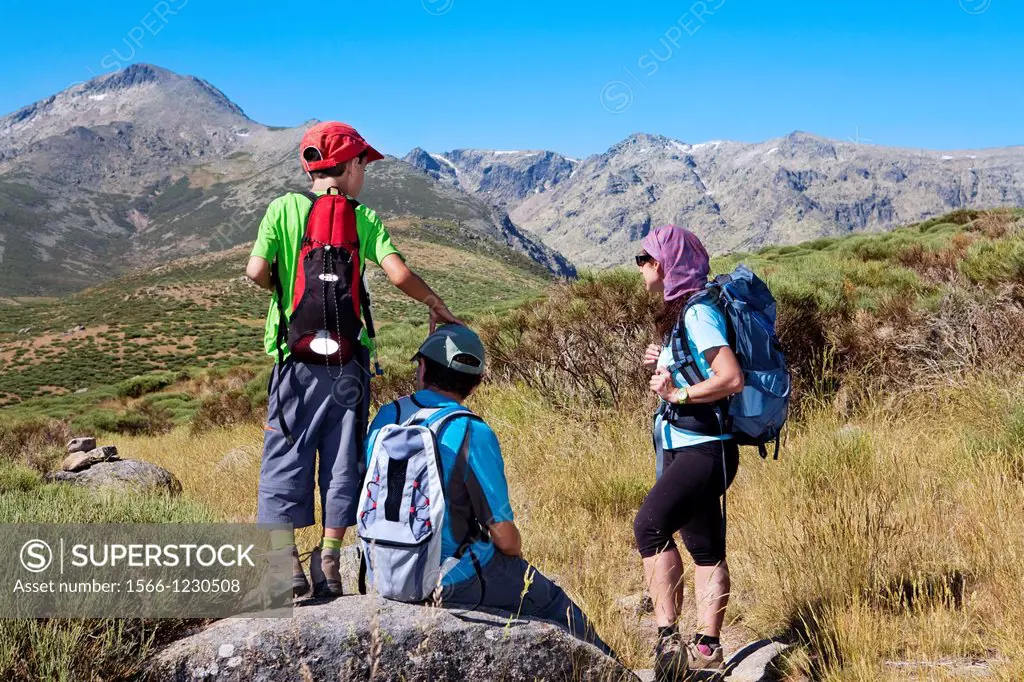 Mountaineers resting in Sierra de Gredos Regional Park, Ávila  Castilla y León  Spain