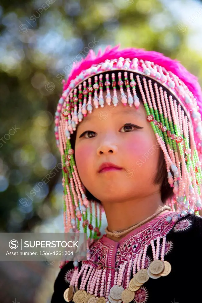 Young Thai girl from the Meo tribe in Doi Suthep temple in Chiang Mai Thailand