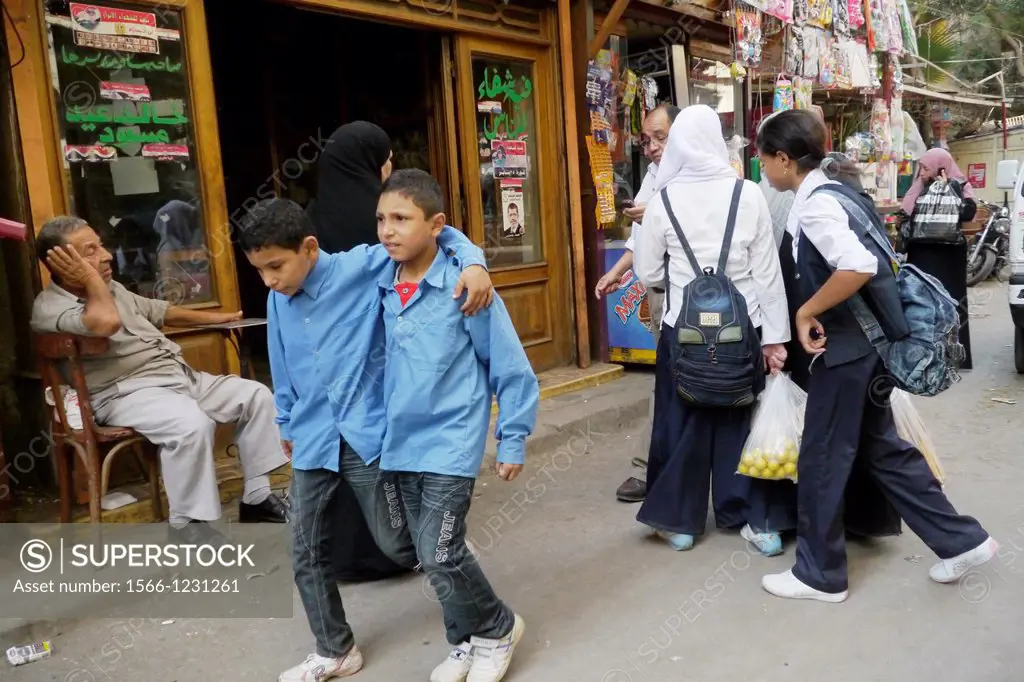Egypt. Street scenes in so called ´Islamic Cairo´, the old quarter of the city near Bab Zuela. School boys walking home