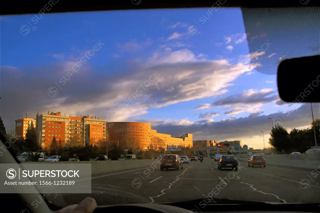 Spain, Madrid, traffic on the M30 at Madrid In the middle a building by architect Bofill