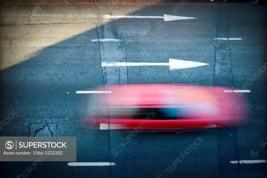 red car on road,